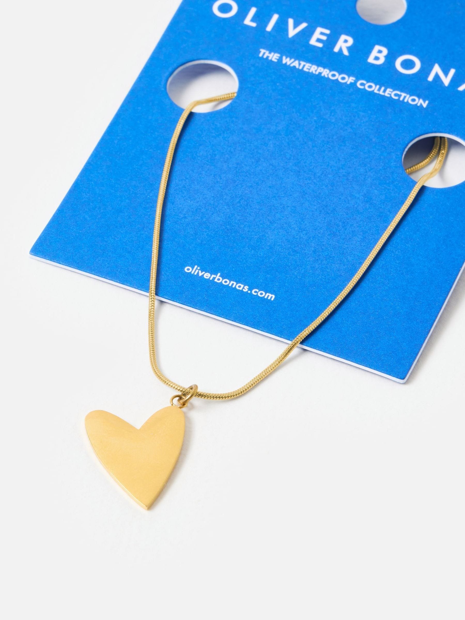 Oliver Bonas gold tone heart pendant necklace (British brand)