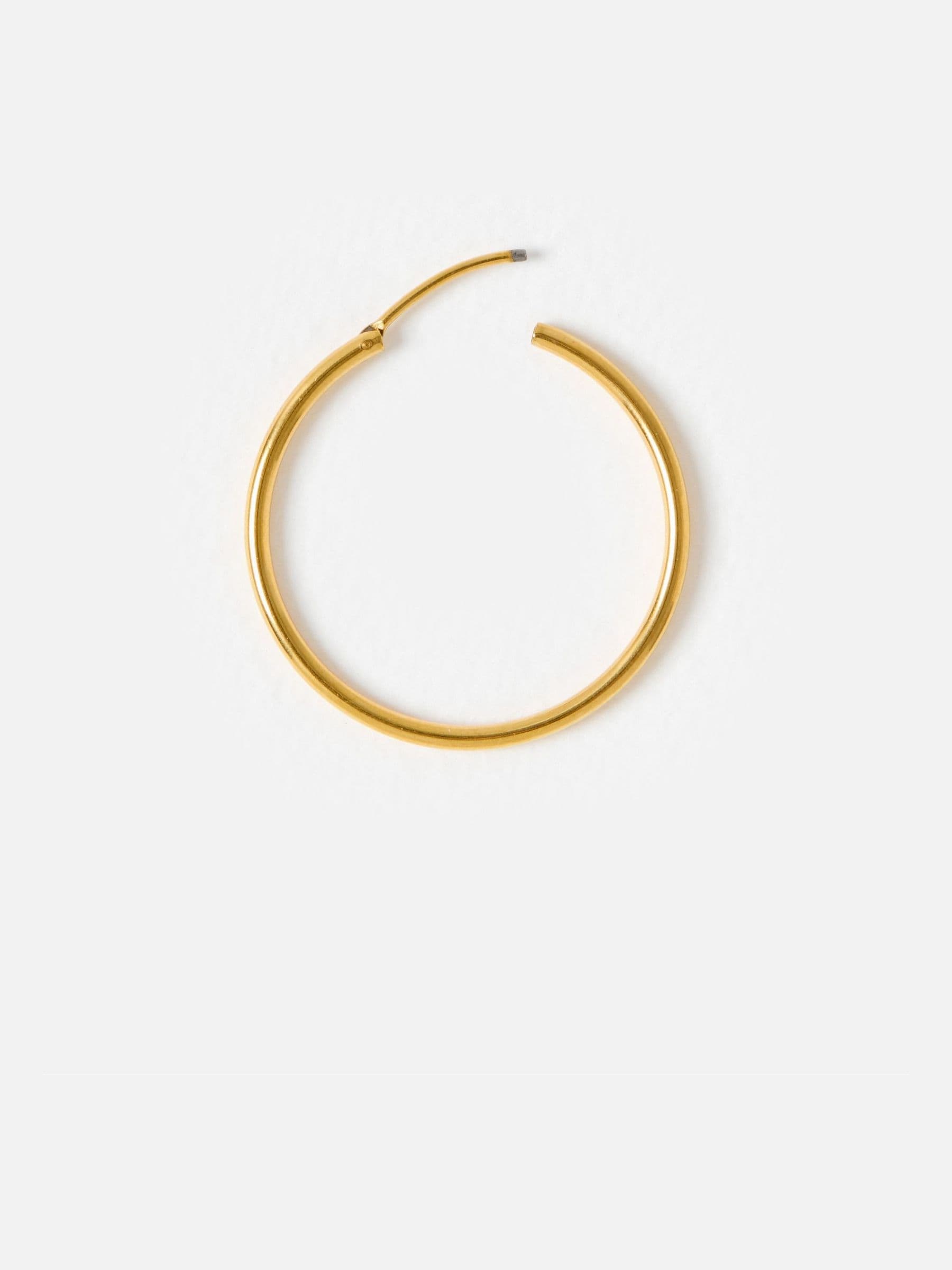Oliver Bonas gold tone small hoop earrings, UK version