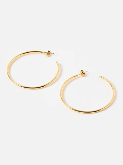 Next Oliver Bonas Gold Tone Janis Shiny Stainless Steel Waterproof Large Hoop Earrings- Buy online at McGrocer
