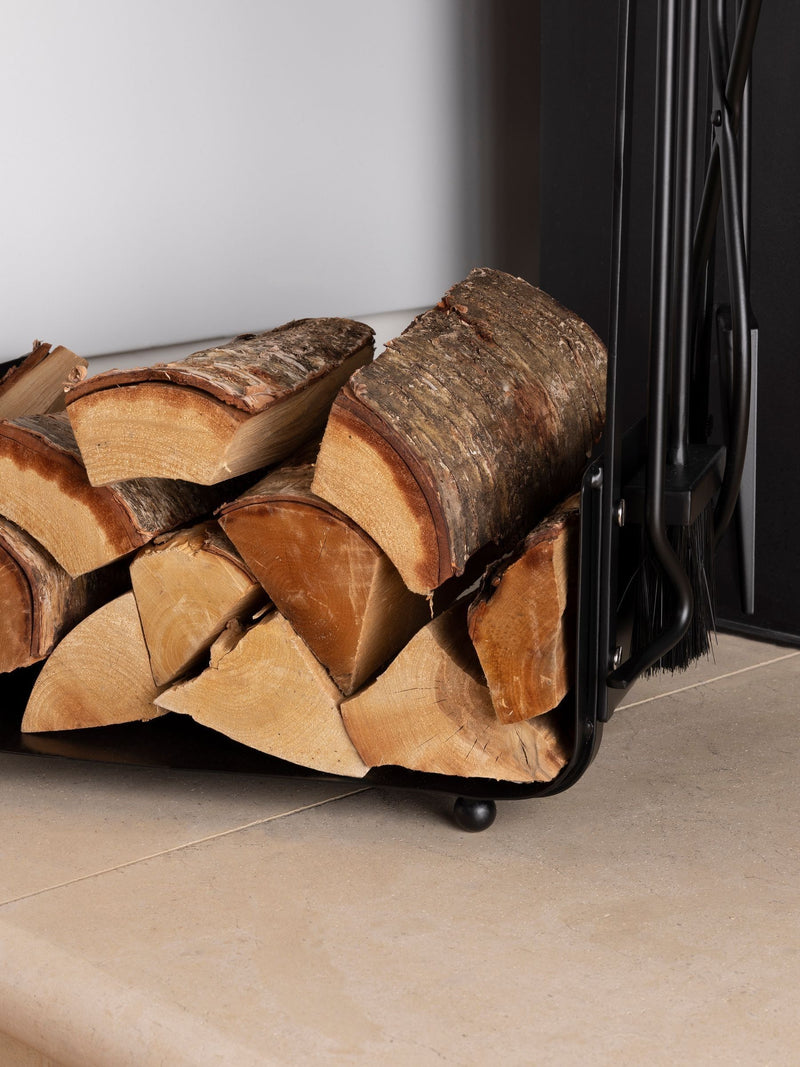 Snug black hazel log holder and fireside companion set (British brand)