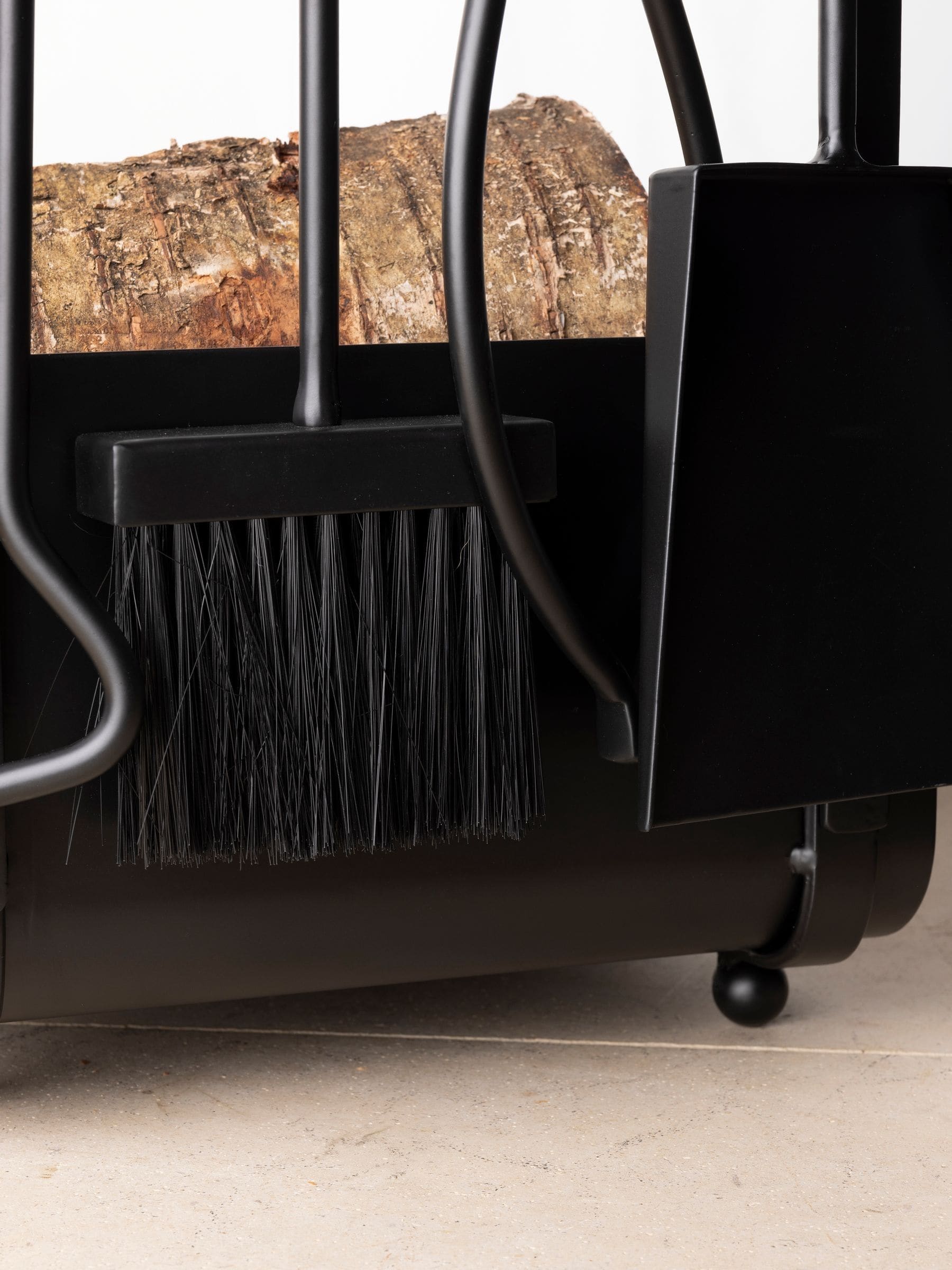 Snug black hazel log holder and fireside companion set (British brand)