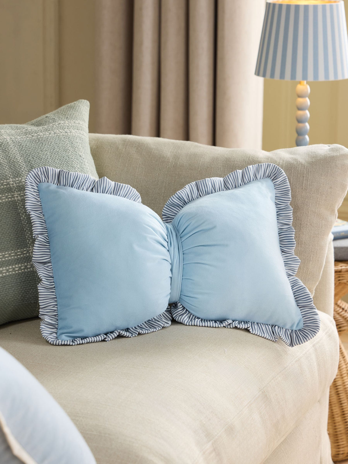 Light blue 3D stripe frill bow cushion (British brand)