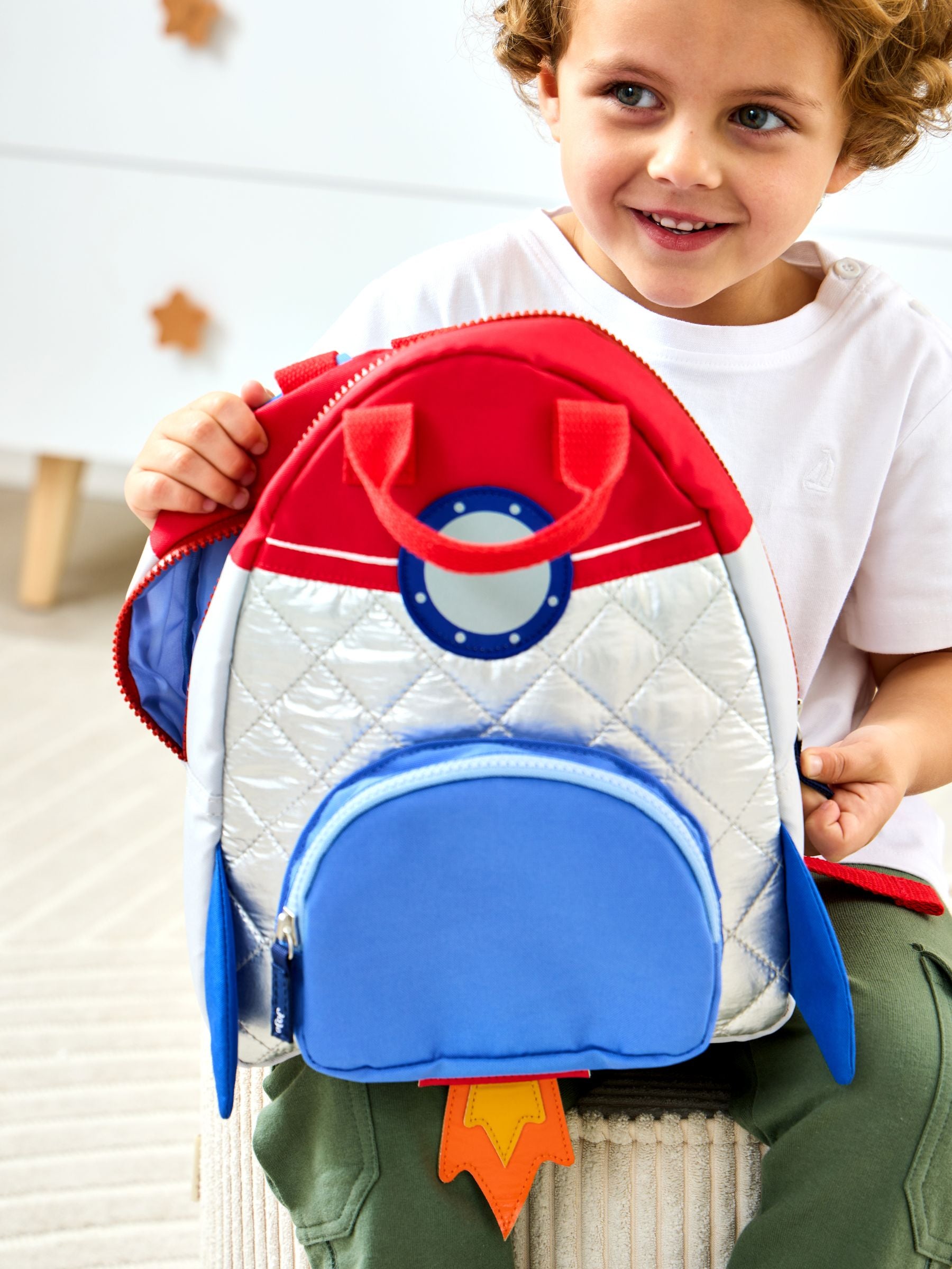JoJo Maman Bébé silver quilted rocket backpack, UK version
