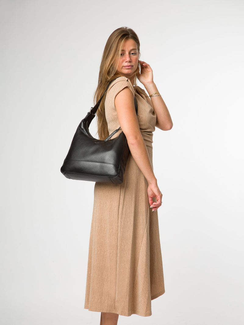 Cultured London black leather shoulder bag with silver fittings - British product