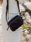 Pure Luxuries London black cross-body bag (British brand)