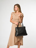 Pure Luxuries London black mochi leather tote bag, imported from the UK