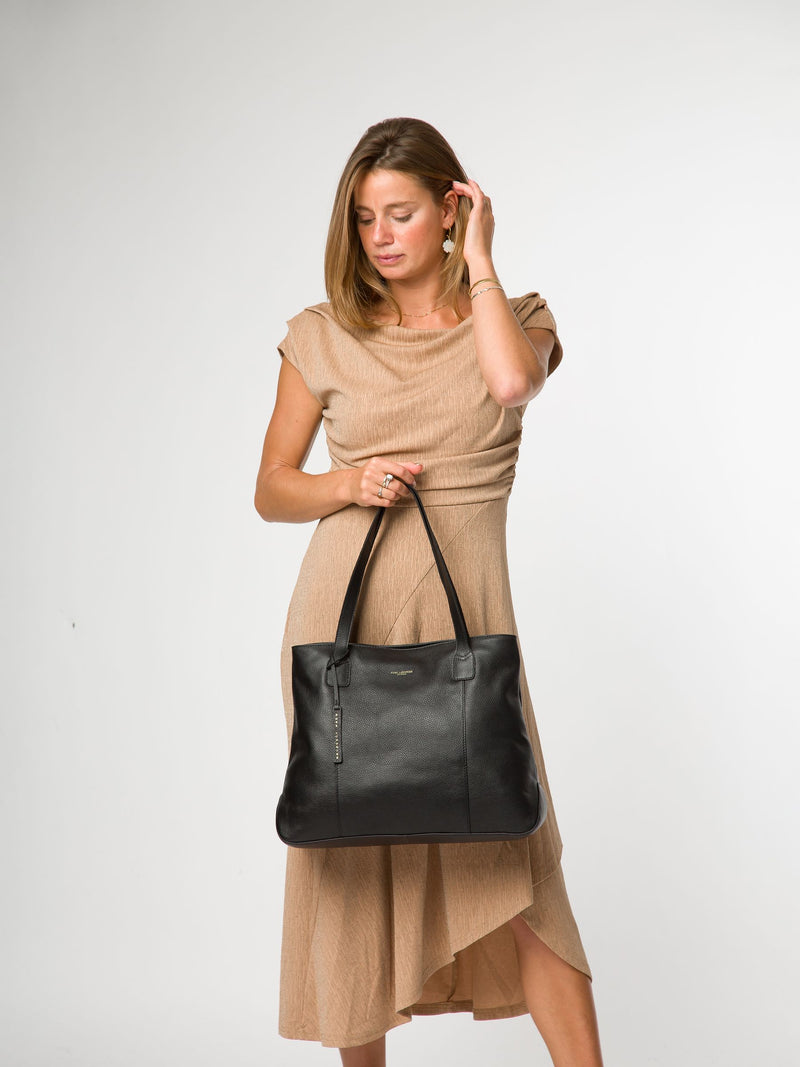 Pure Luxuries London black mochi leather tote bag, imported from the UK