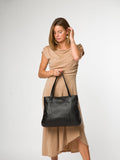 Pure Luxuries London black mochi leather tote bag, imported from the UK