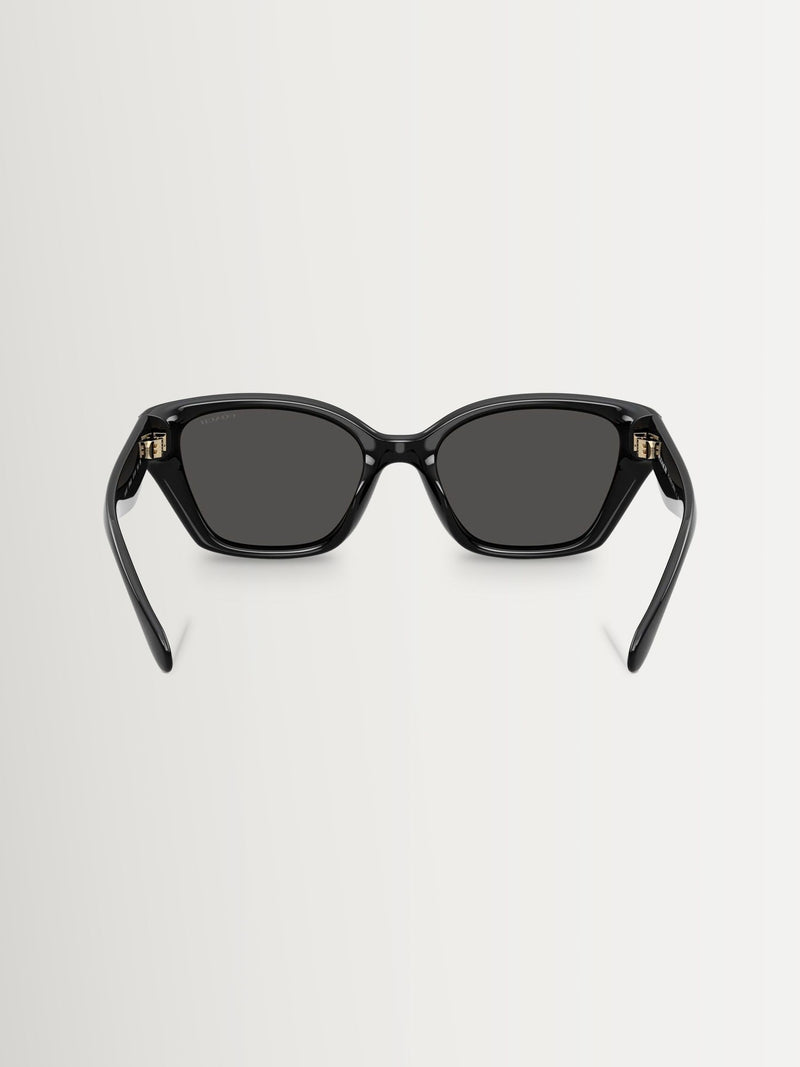COACH black irregular sunglasses with grey solid lenses, imported from the UK