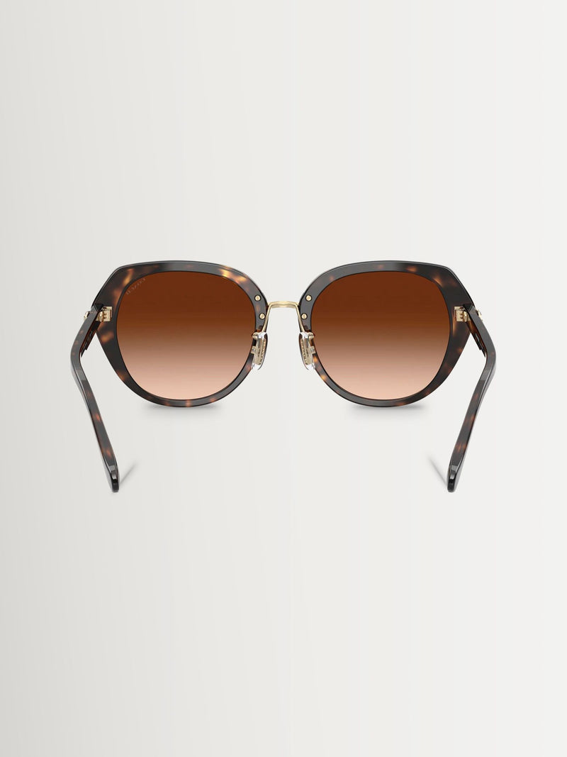 Coach irregular brown sunglasses with gradient lenses (British brand)