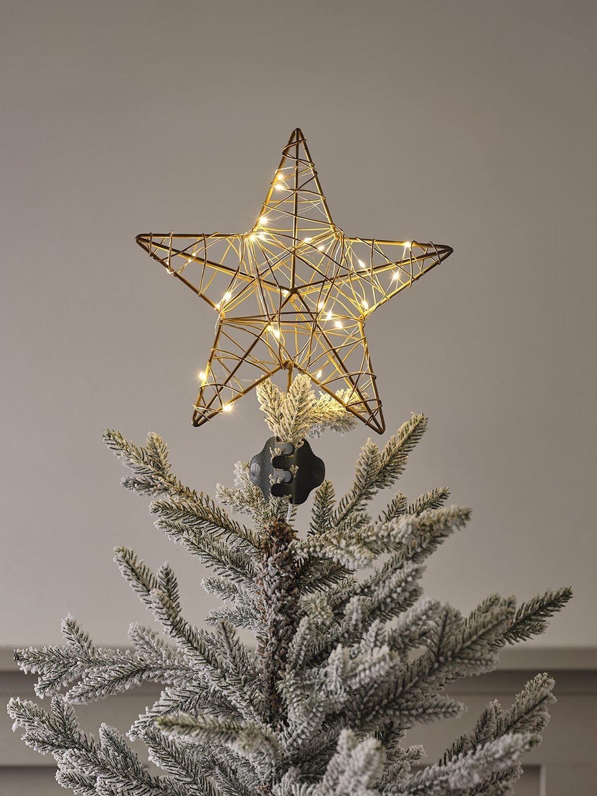 Lights4fun gold star tree topper, imported from the UK
