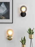 Searchlight black glass ball wall light - British product