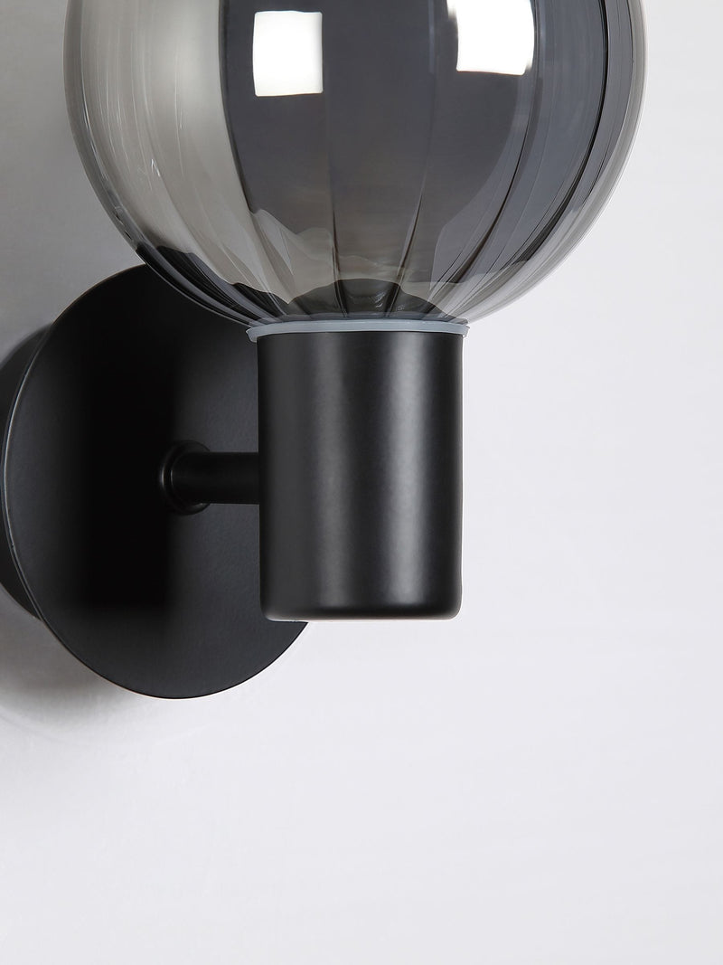 Searchlight black glass ball wall light - British product