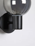 Searchlight black glass ball wall light - British product