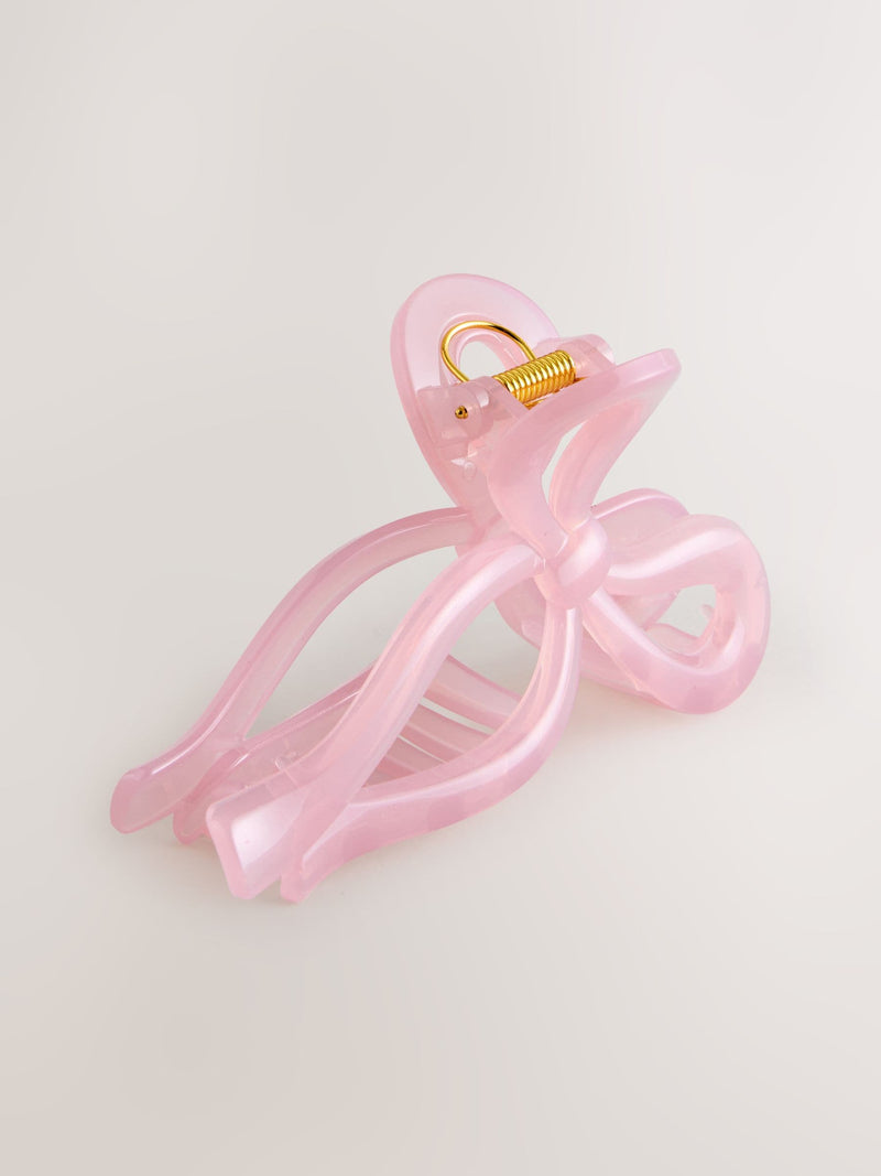 Pink resin bow claw clip (British brand)