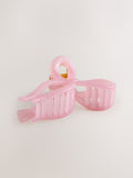Pink resin bow claw clip (British brand)