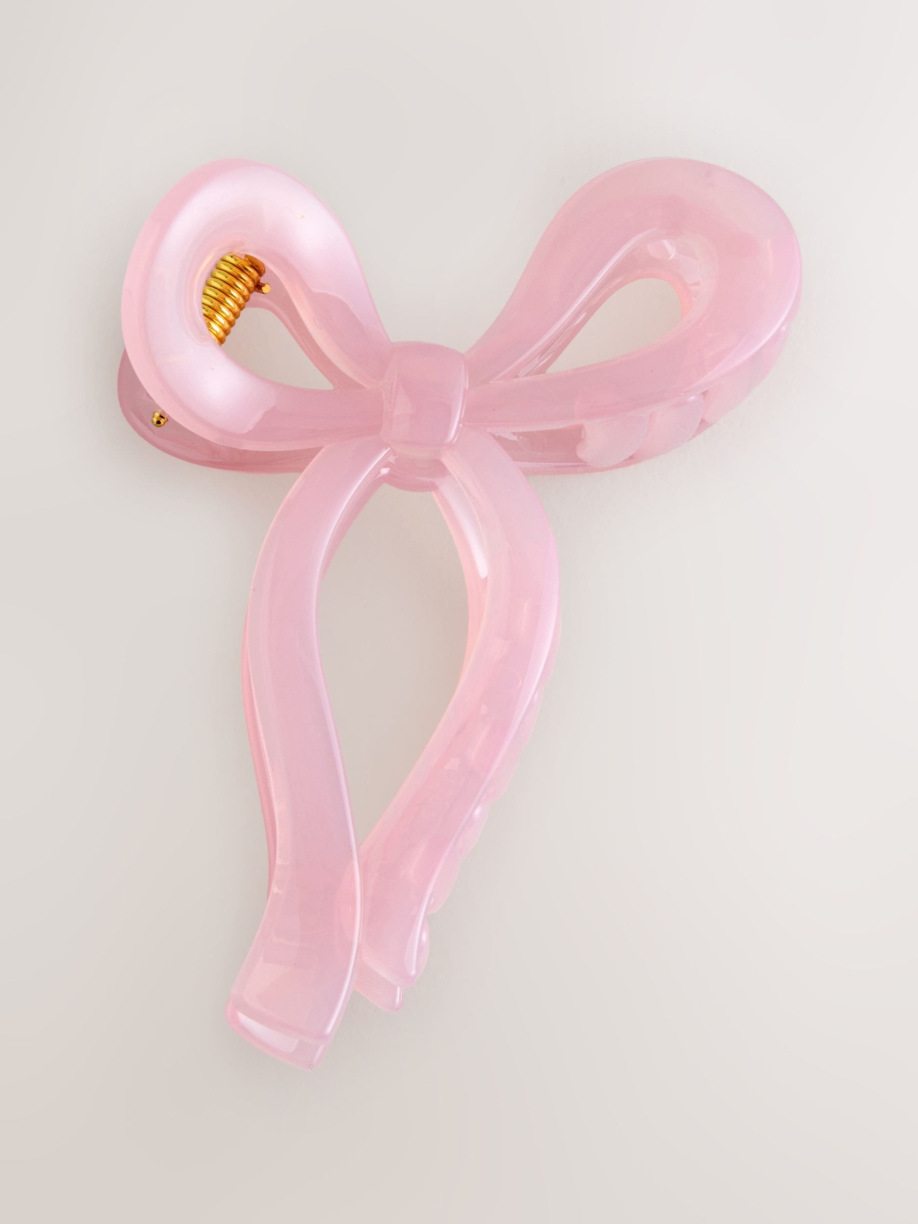 Pink resin bow claw clip (British brand)