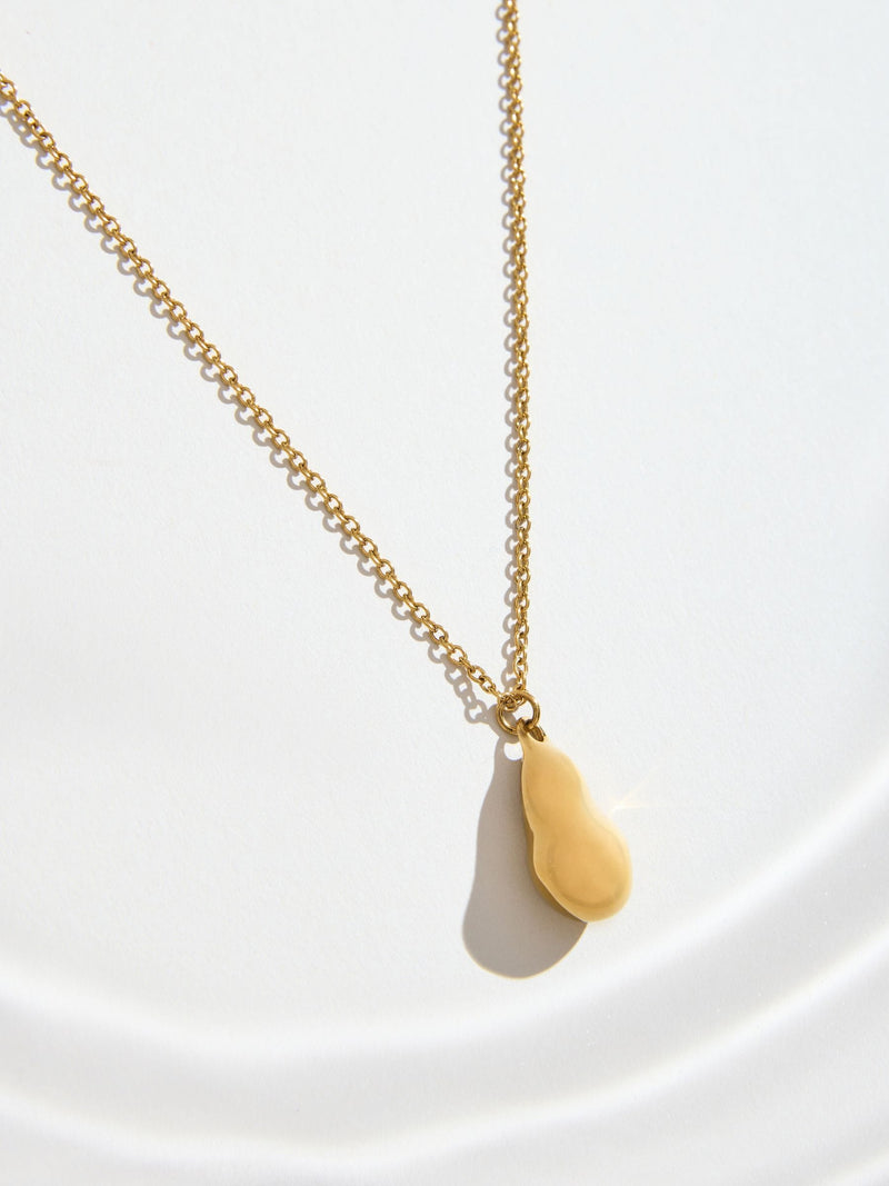 Gold tone stainless steel long pendant necklace (British brand)