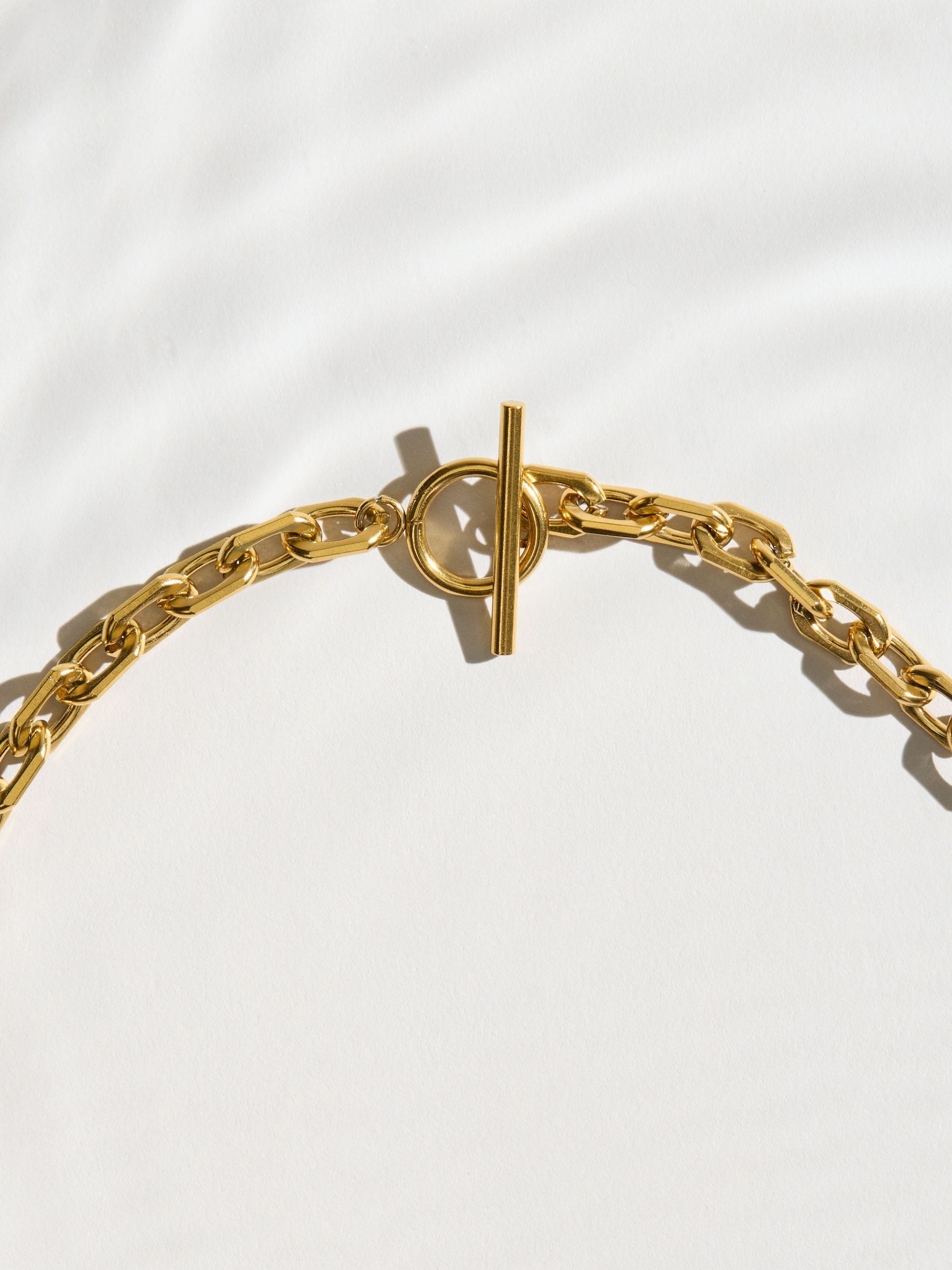 gold tone T-bar necklace waterproof stainless steel, UK version