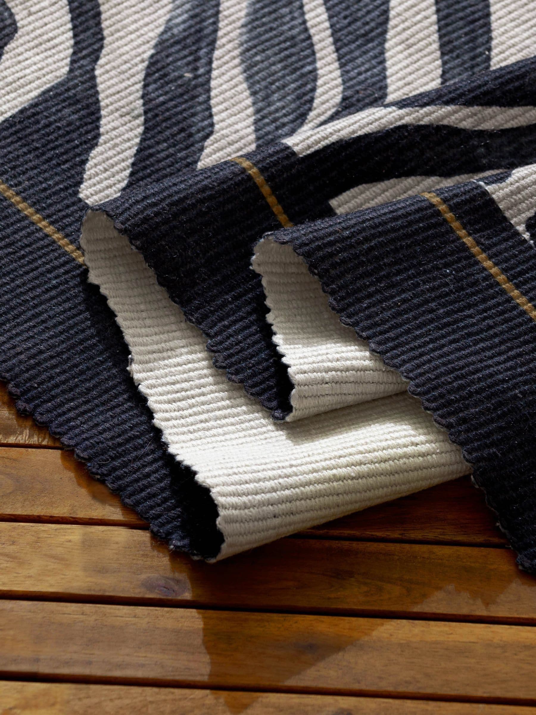Paoletti zebra printed indoor outdoor rug 120x170cm, UK version