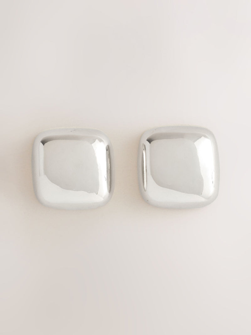 Silver tone square stud earrings in recycled zinc from a British brand