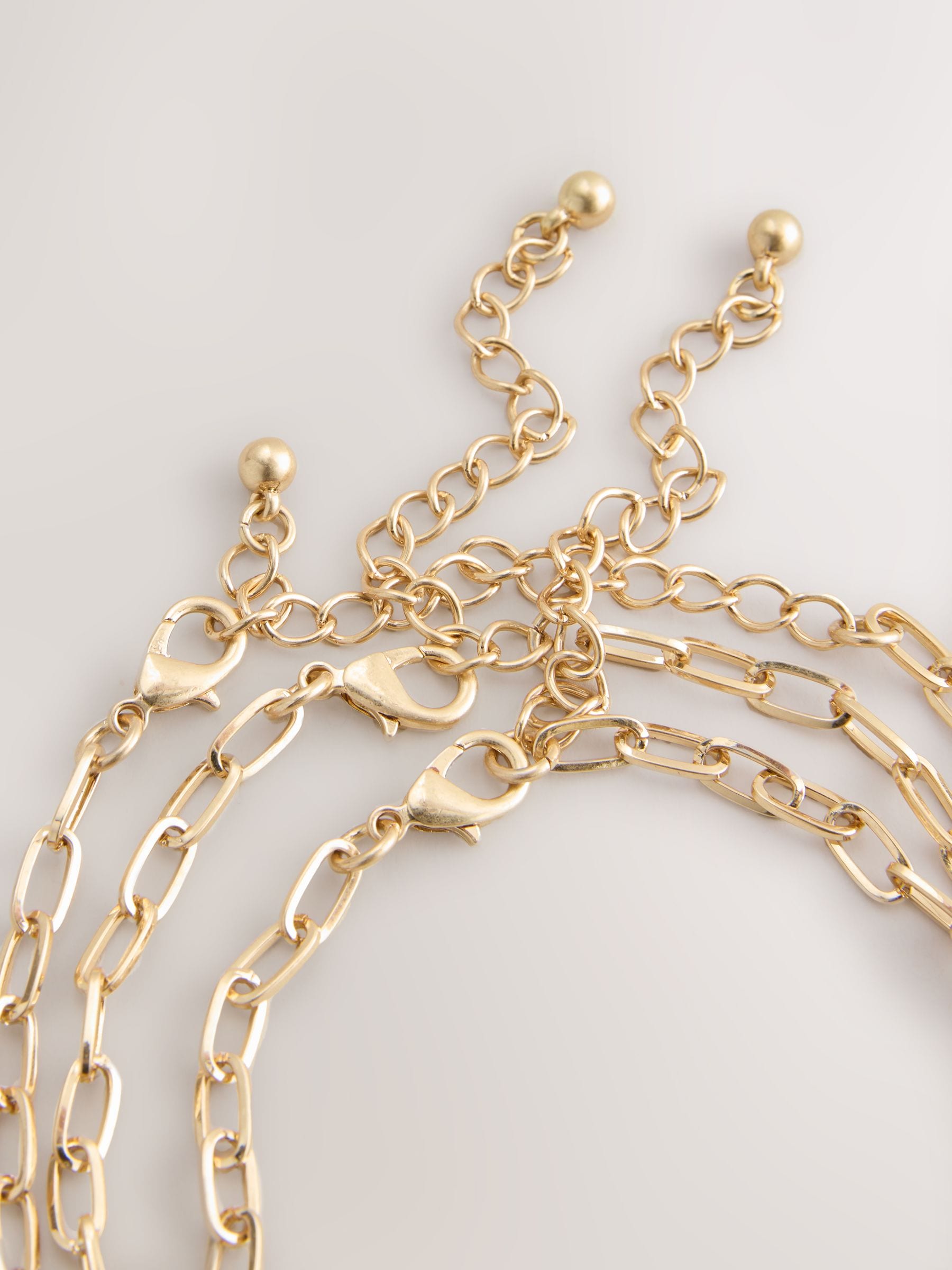Gold tone three-layer charm chain necklace, UK version