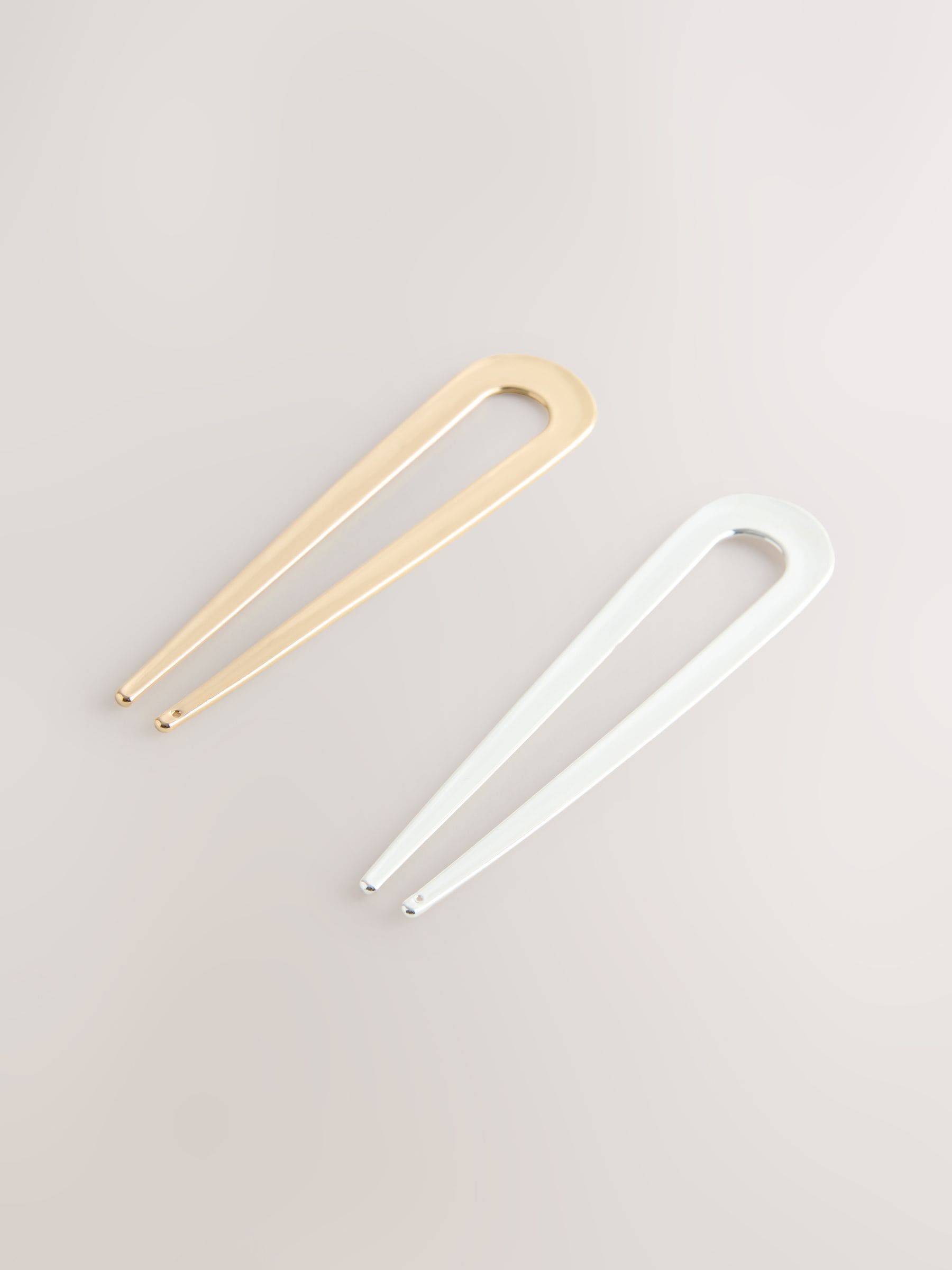 Set of two hair pins in gold and silver tones - British product