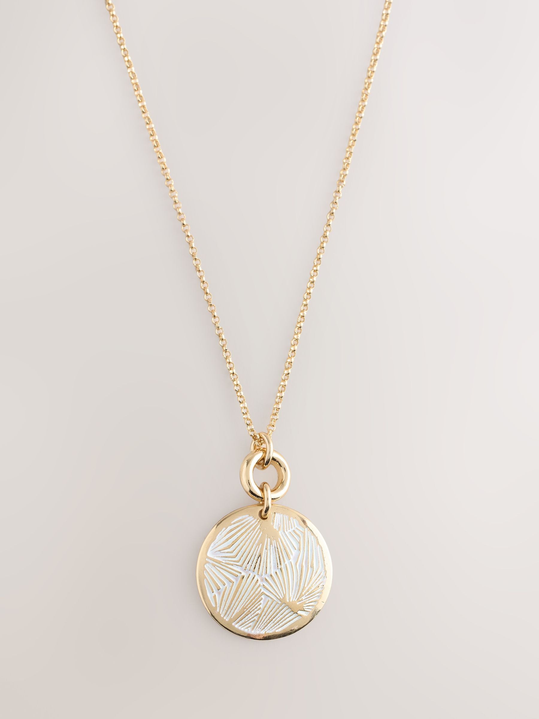 Gold tone etched pendant necklace, imported from the UK