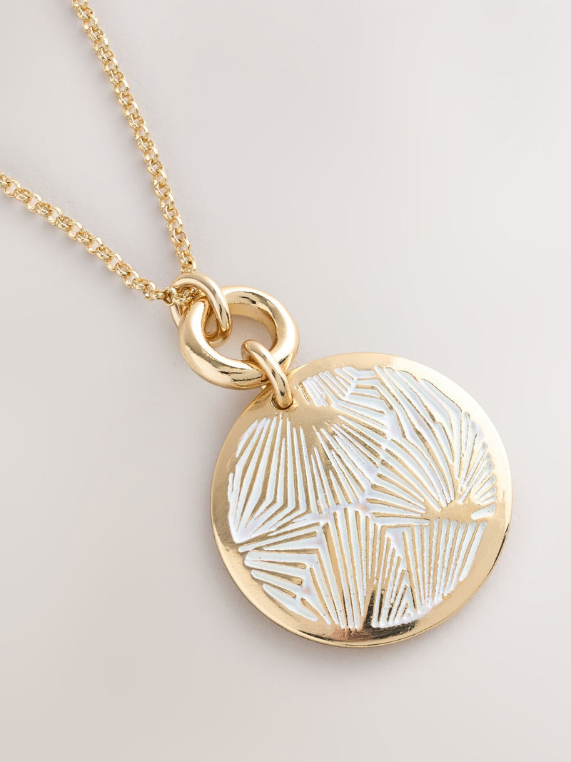 Gold tone etched pendant necklace, imported from the UK