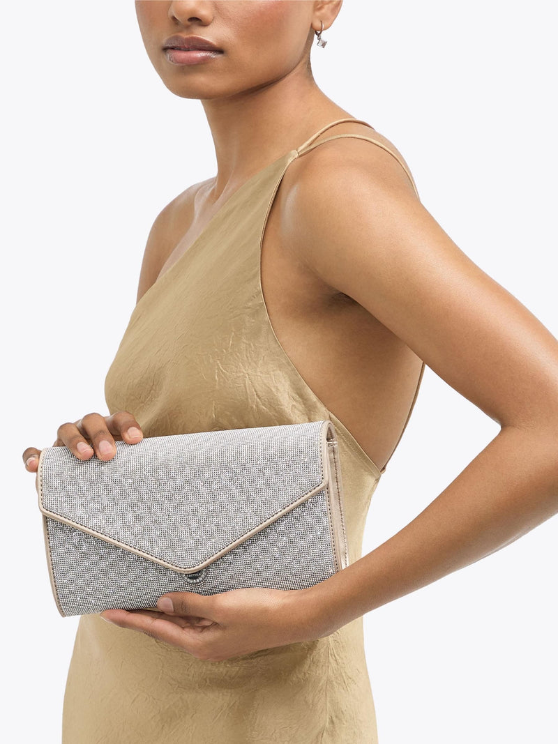 Carvela silver spiral envelope clutch bag, imported from the UK