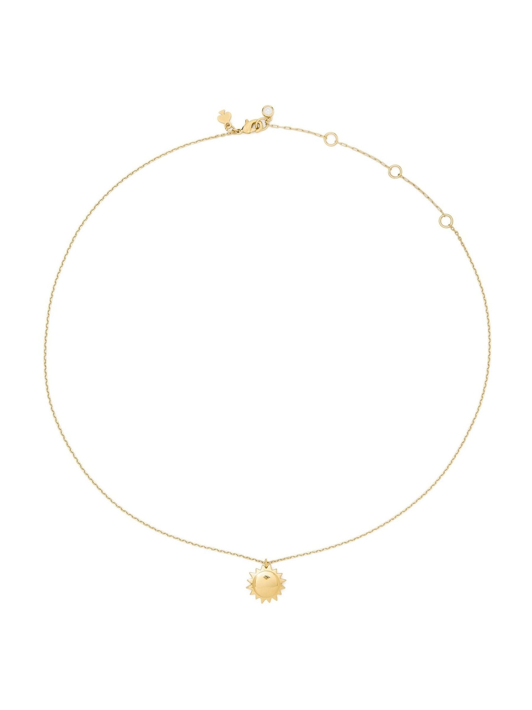 Kate Spade gold tone sun pendant necklace, imported from the UK
