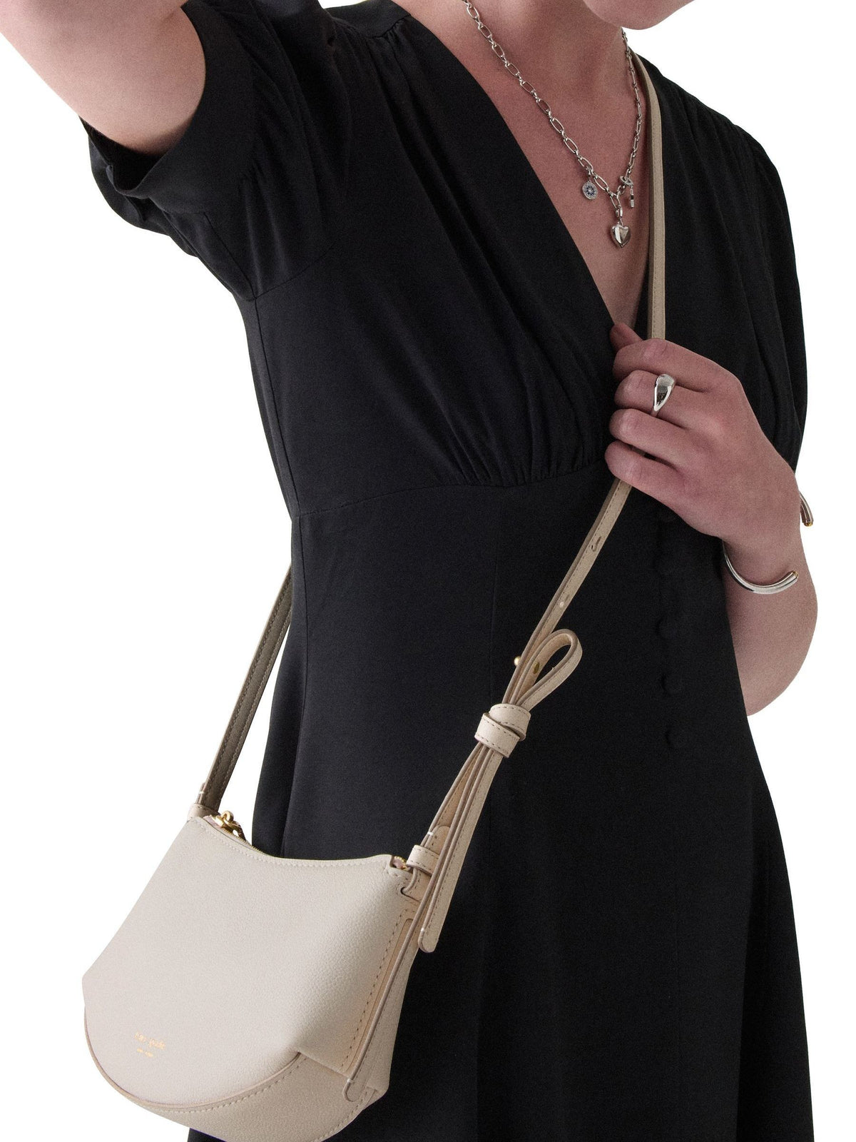 Kate Spade Cream Loop Pebbled Leather cross-body bag, imported from the UK