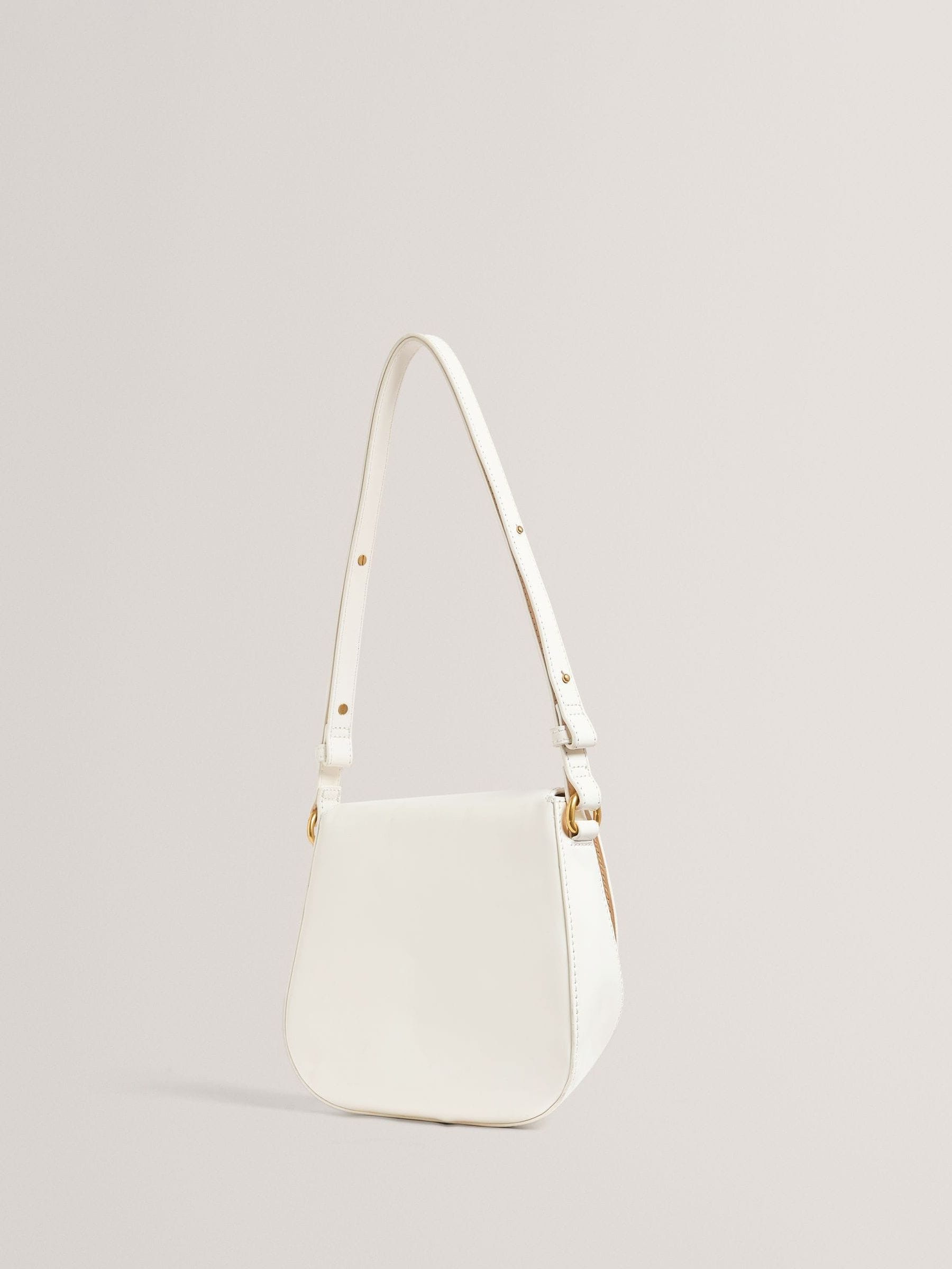 Ted Baker cream shoulder bag with twist lock and raffia trim, UK version
