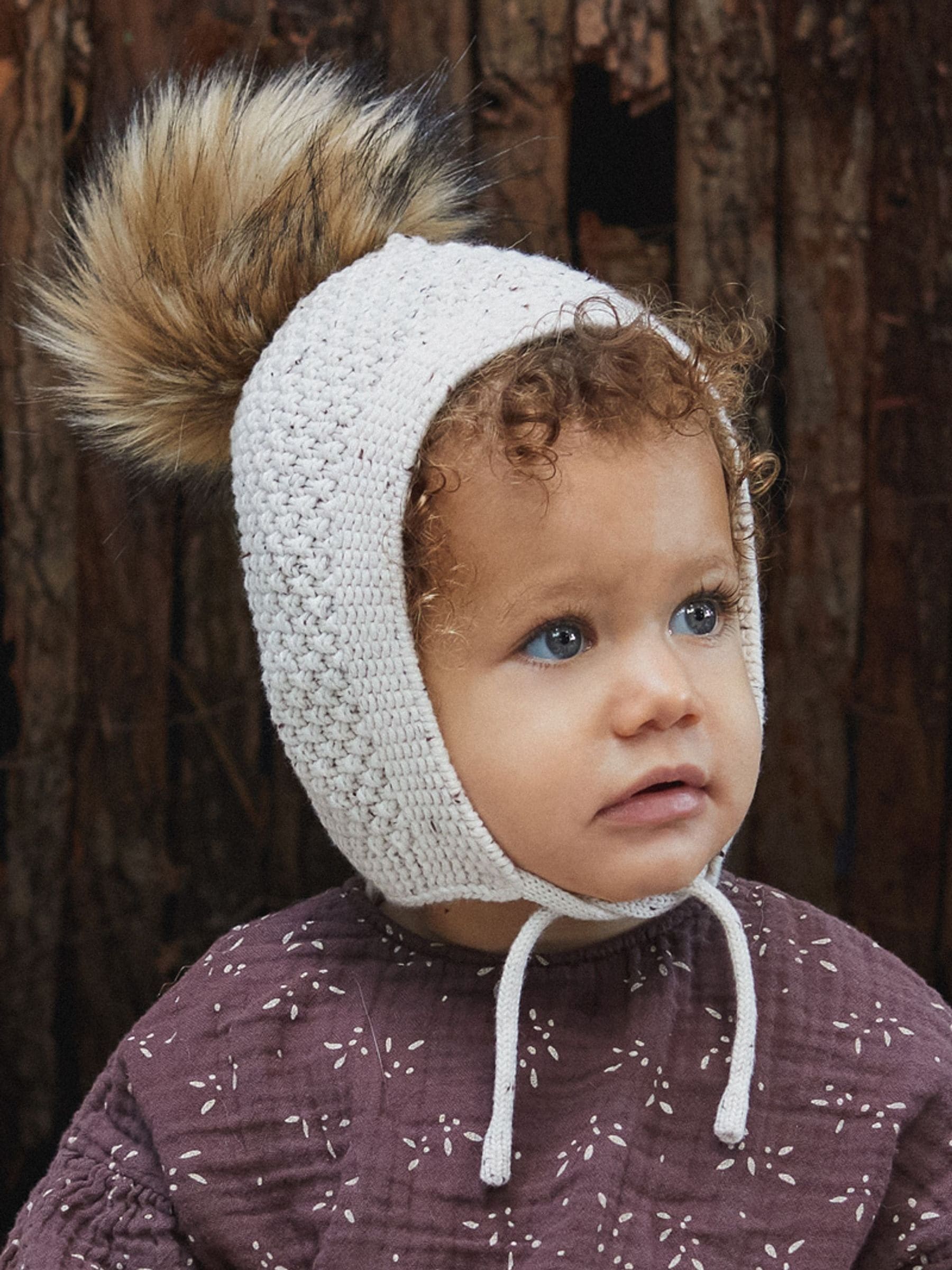 The Little Tailor baby hat with faux fur pom pom - British product