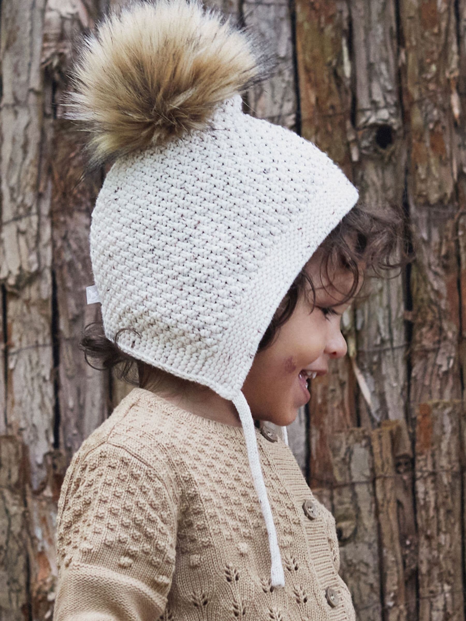 The Little Tailor baby hat with faux fur pom pom - British product