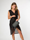 Pure Luxuries black leather Venetia grab clutch bag, imported from the UK