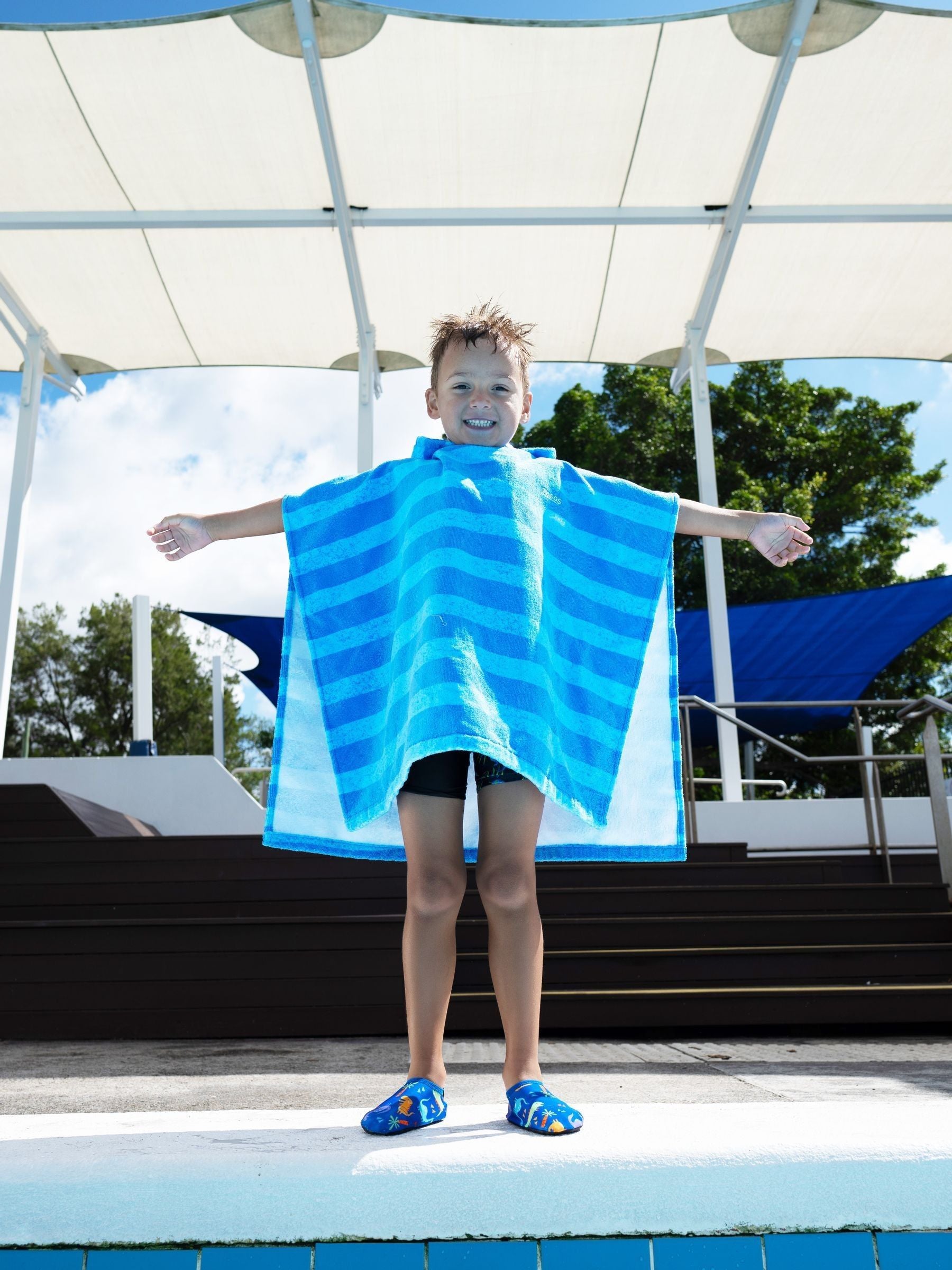 Zoggs blue hooded poncho towel in nautical stripes (British brand)