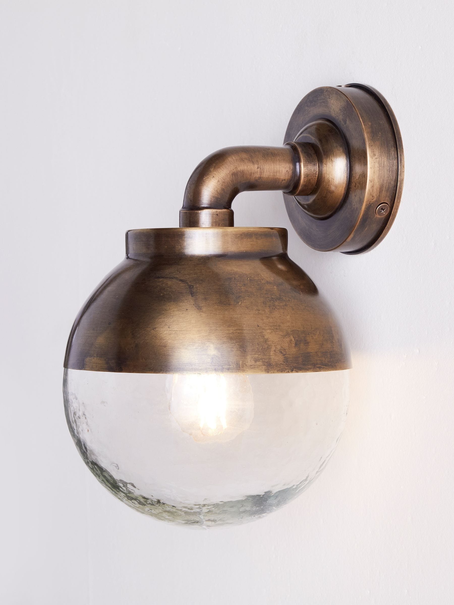 Nkuku antique brass outdoor wall lamp, UK version