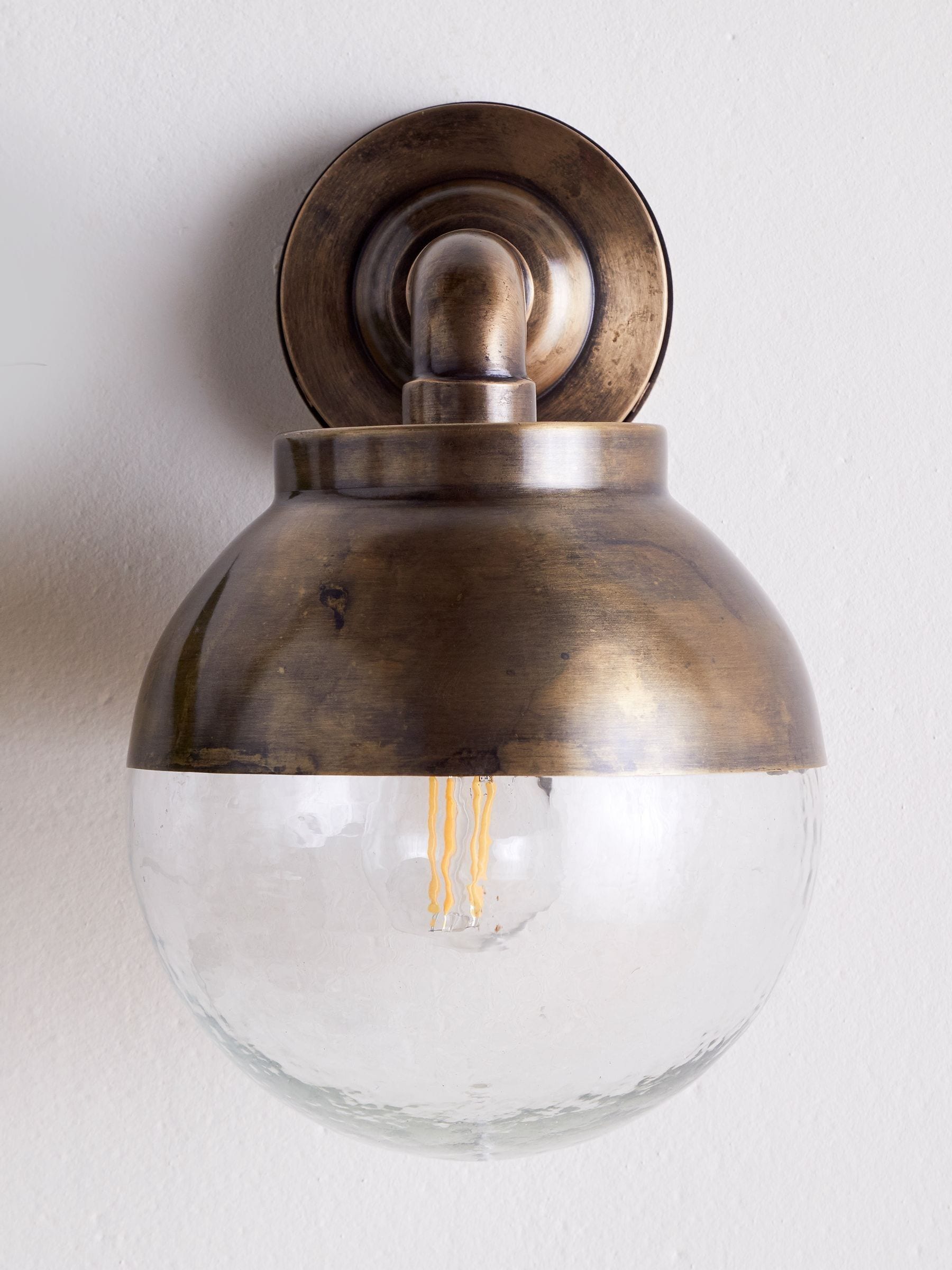 Nkuku antique brass outdoor wall lamp, UK version