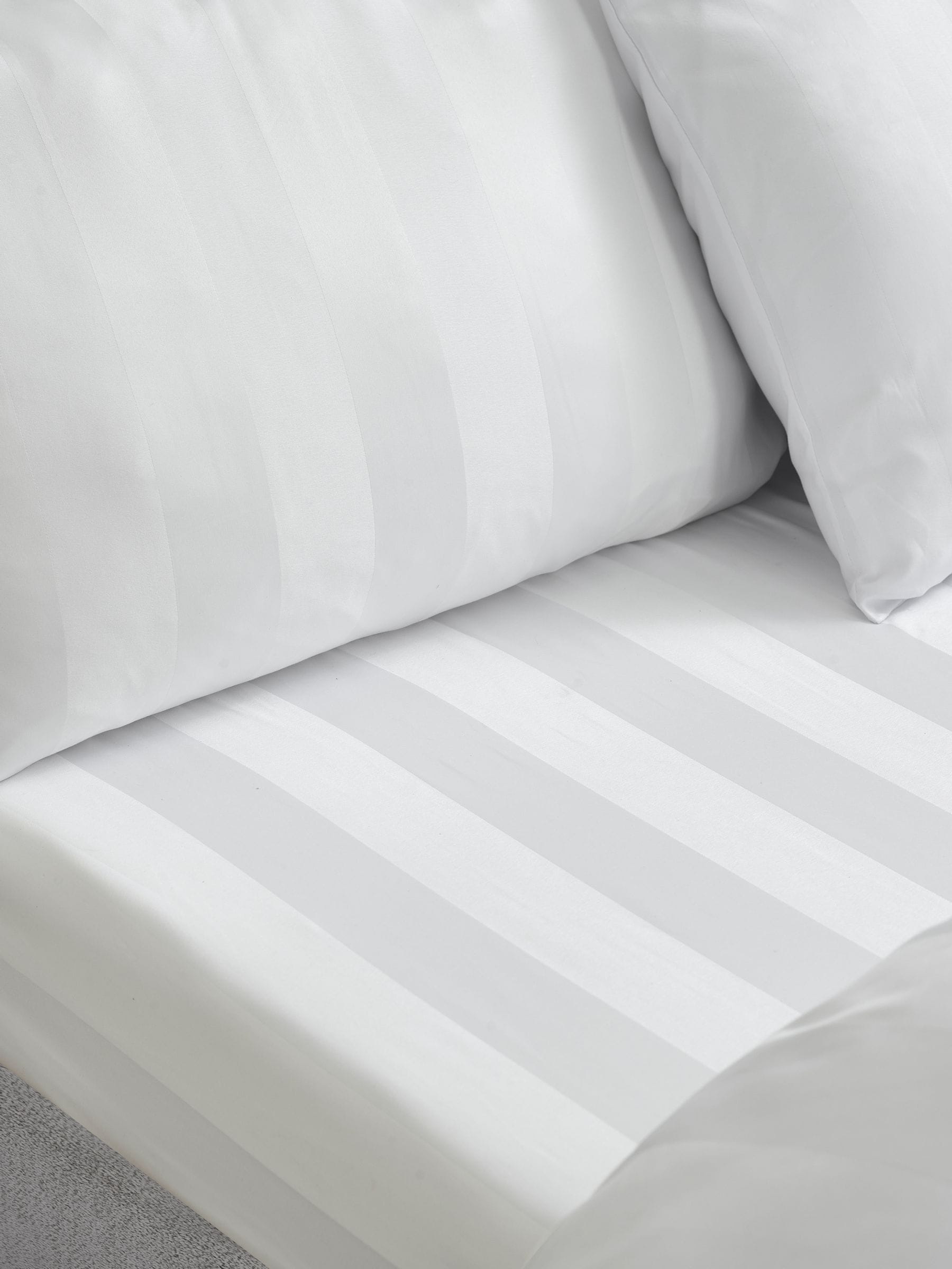 Catherine Lansfield white satin stripe pillowcases 4-pack, imported from UK