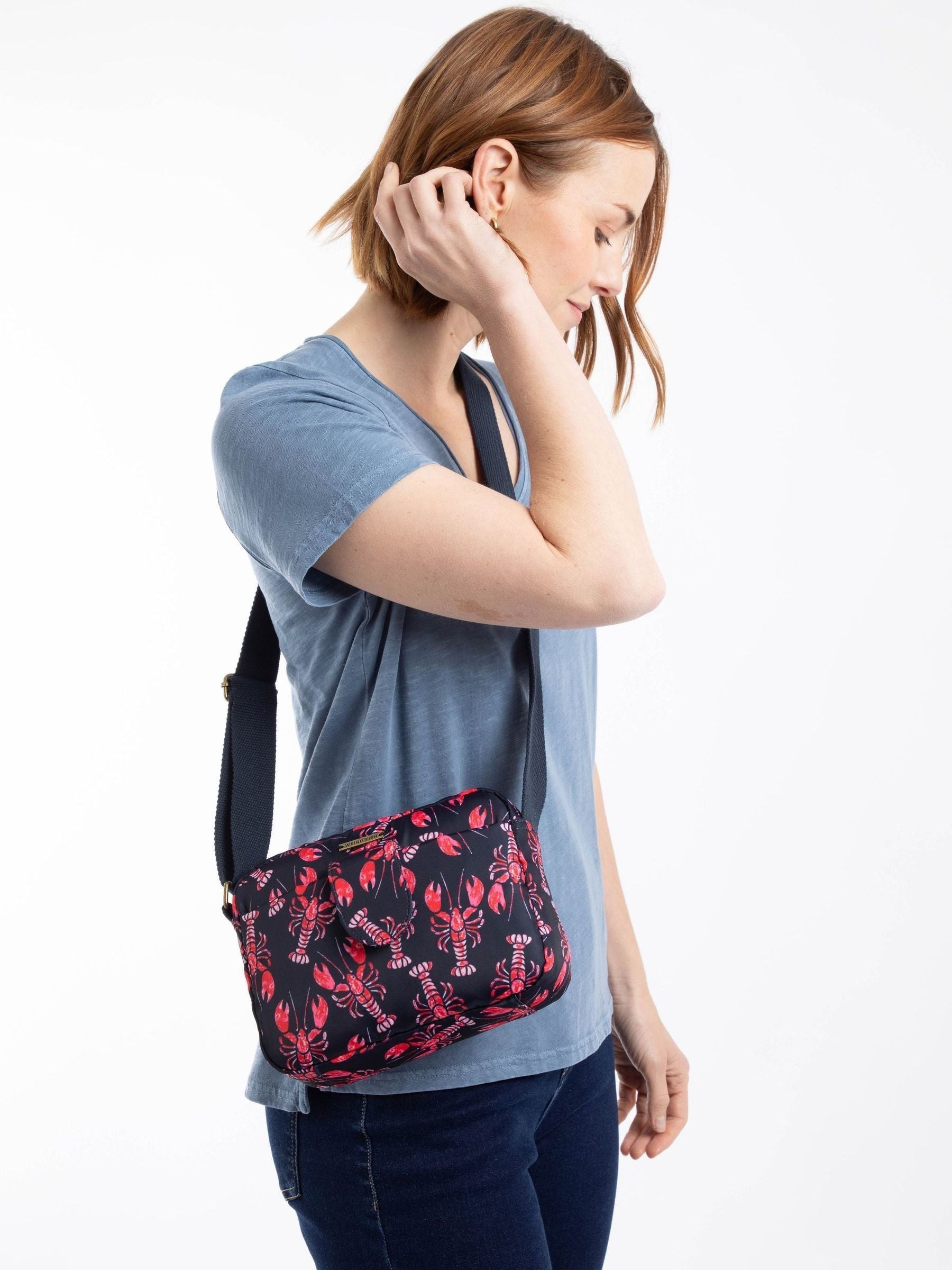 Weird Fish blue Corrie printed cross-body bag, imported from the UK