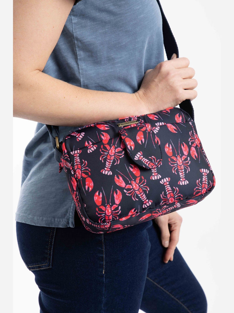 Weird Fish blue Corrie printed cross-body bag, imported from the UK