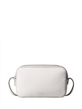 Calvin Klein white foil logo camera bag (British brand)