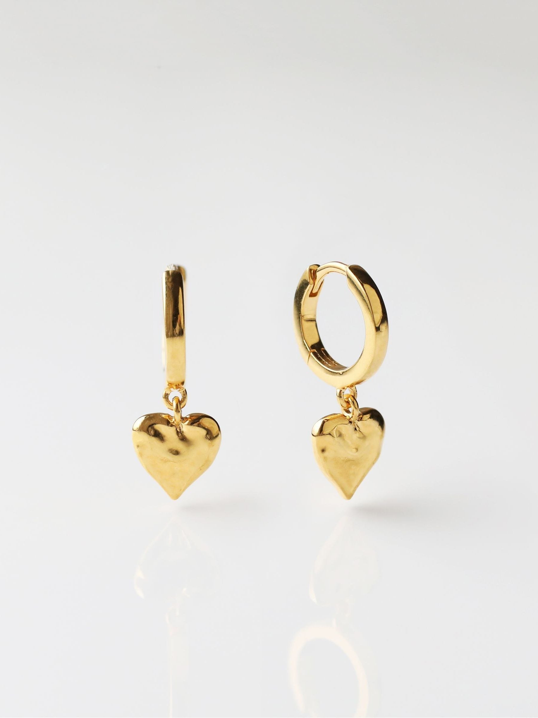 Carrie Elizabeth loveheart drop huggie hoops gold tone, imported from the UK