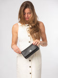 Pure Luxuries London Christabel black leather cross-body bag, UK version