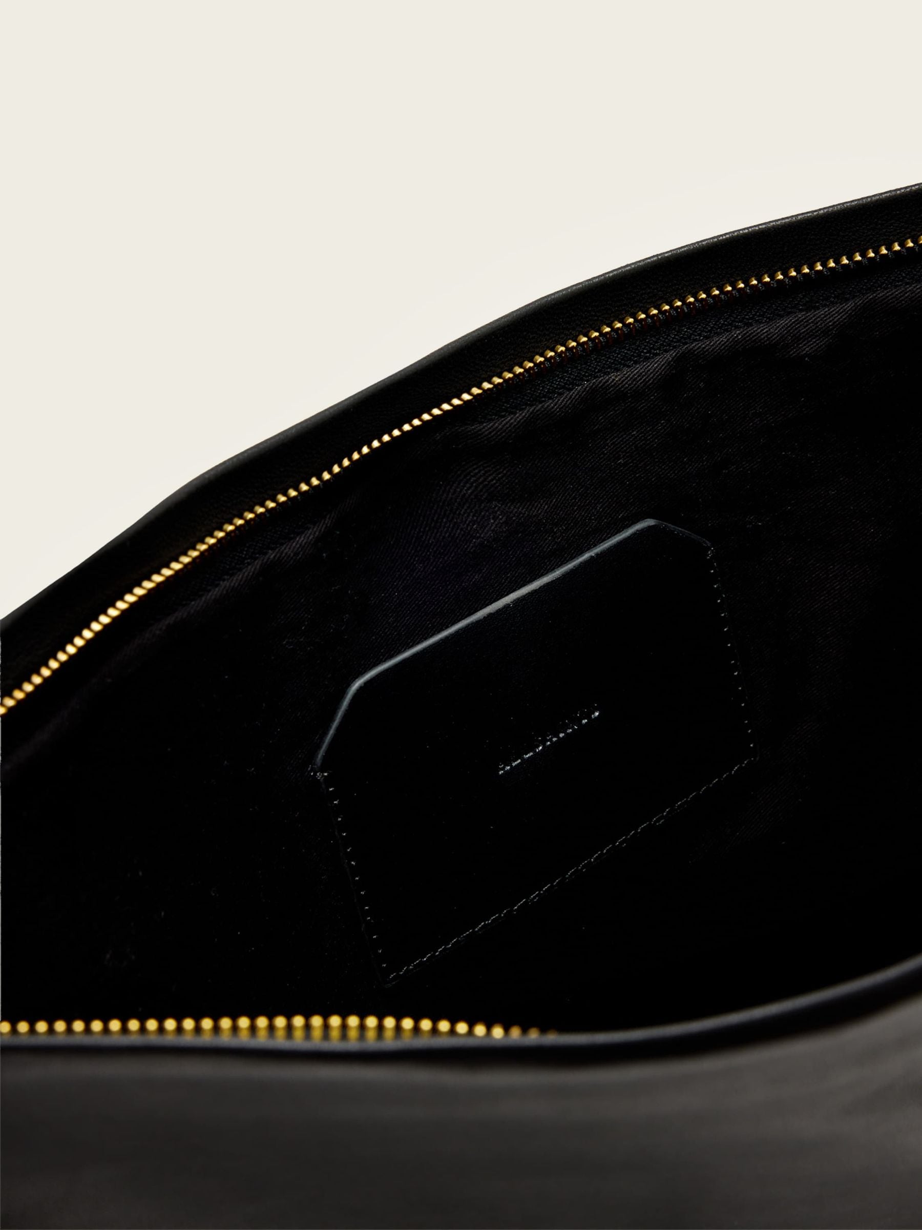 AllSaints Bettina black leather clutch, imported from the UK
