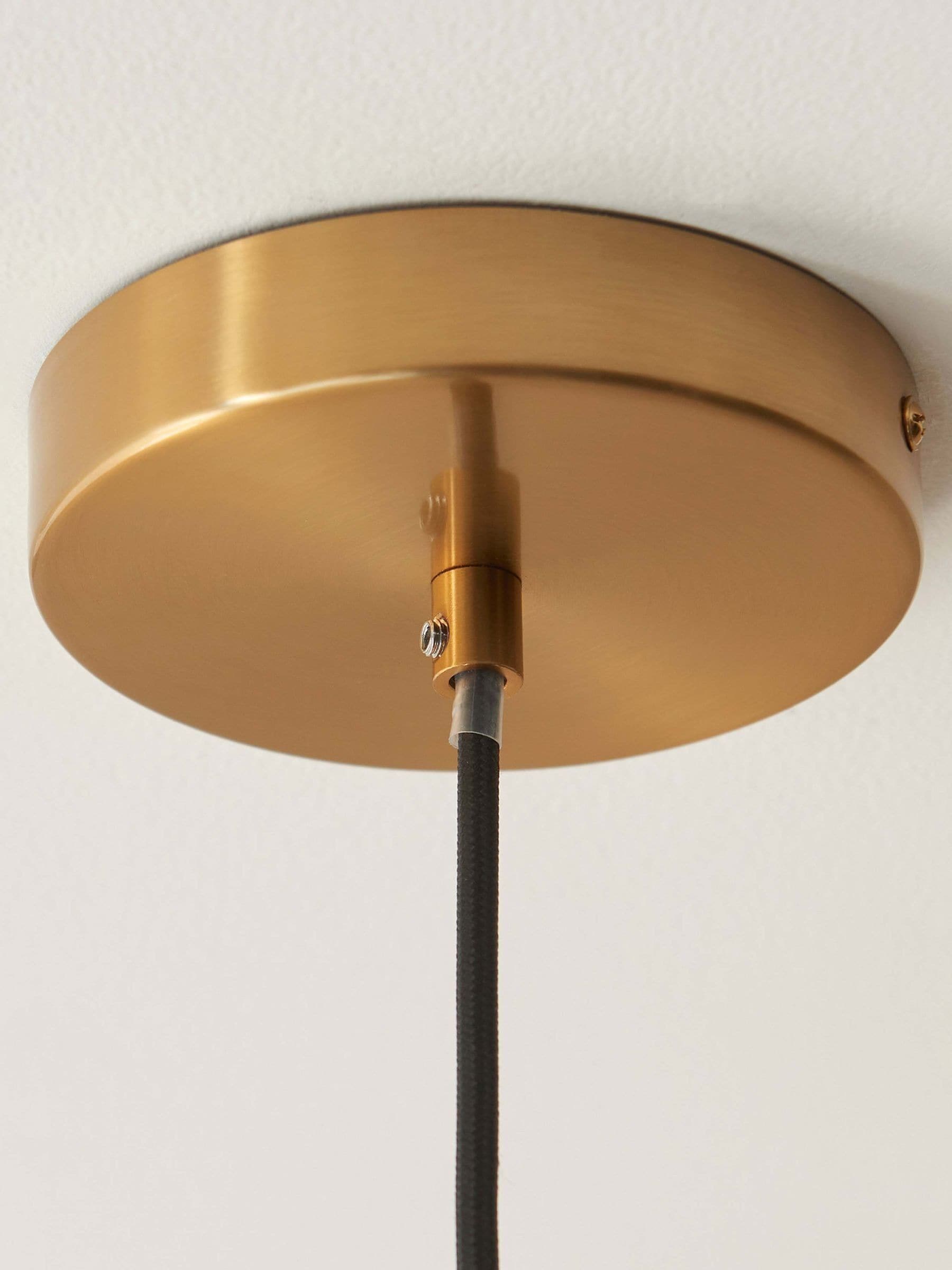 Gallery Home dark brown travertine ceiling pendant light, imported from the UK