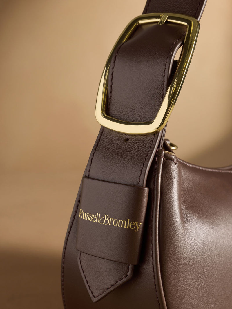 Russell & Bromley Sutton small oval shoulder bag brown (British brand)