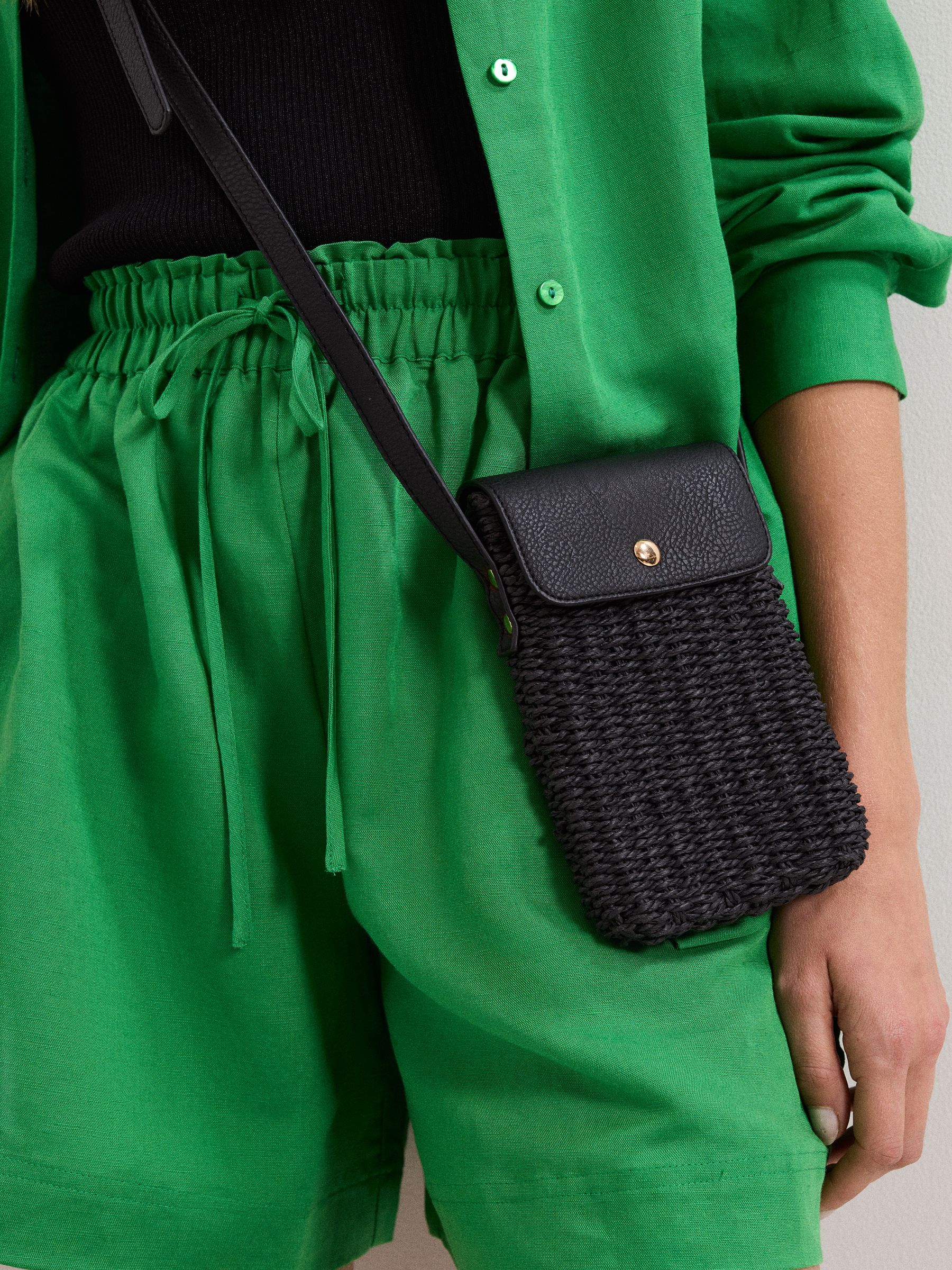 Phase Eight black straw cross-body phone case, imported from the UK