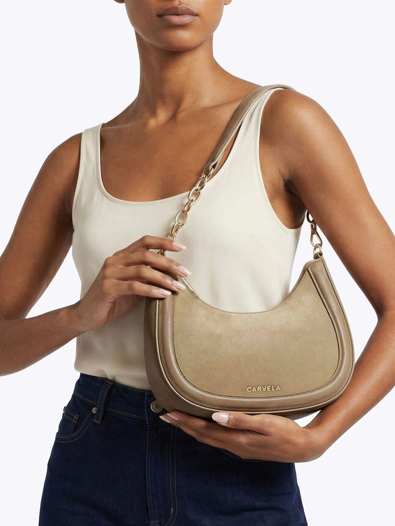 Carvela Minori Scoop shoulder bag with suede detailing, imported from the UK